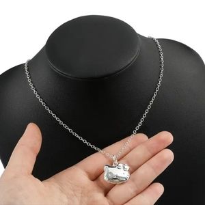 HELLO KITTY NECKLACE and SILVER PLATED ON 18" SILVER CHAIN, NEW
